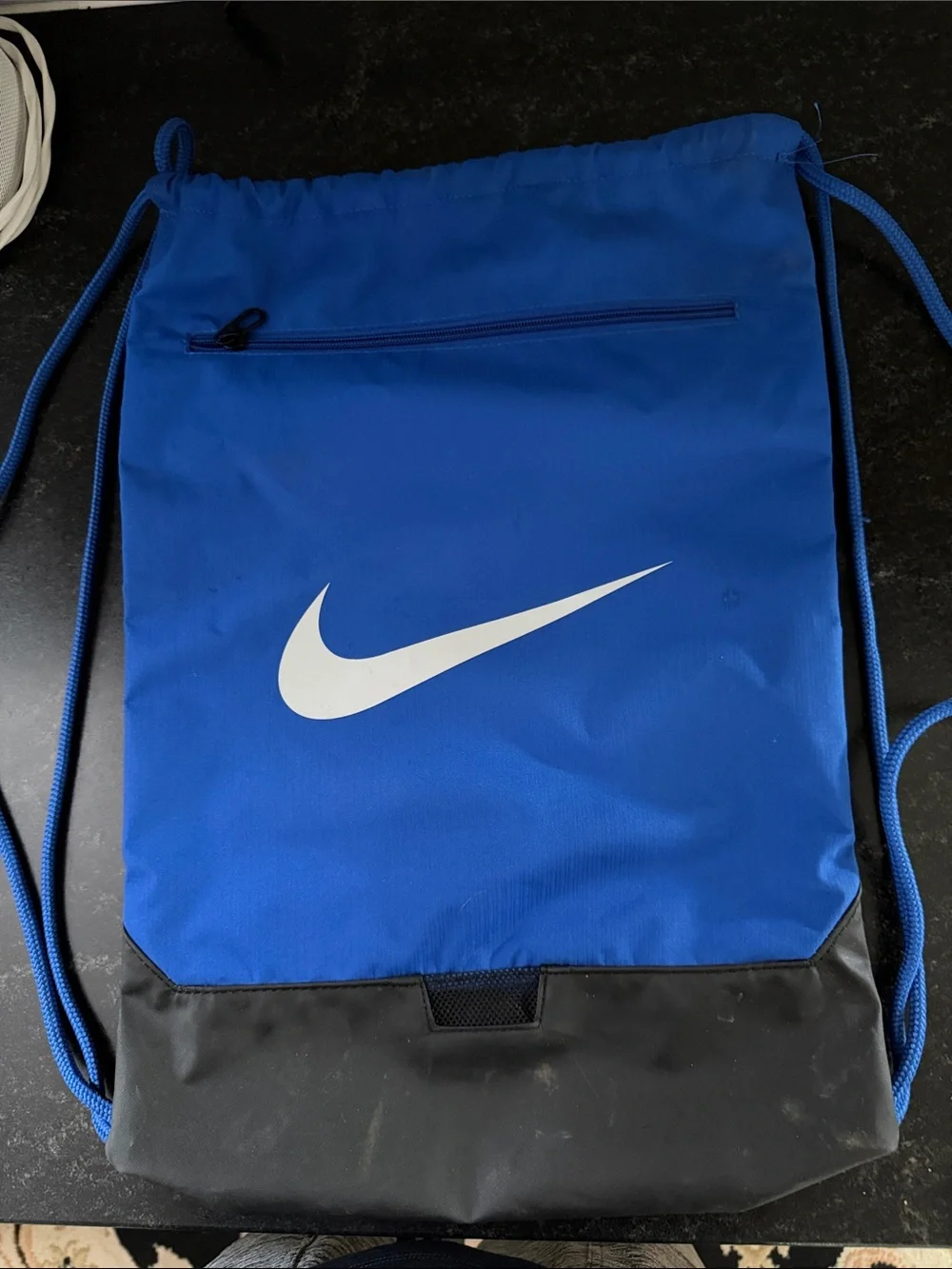 Nike Royal Blue Drawstring Backpack with White Swoosh and Black Base